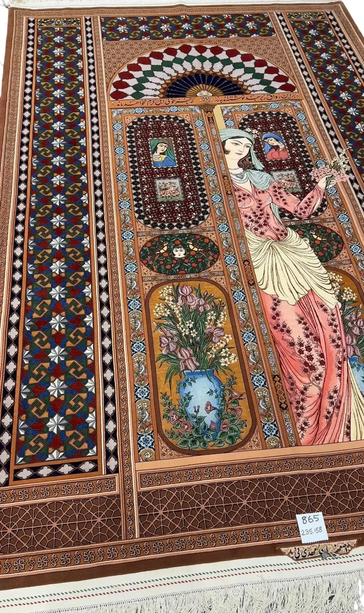 "Elegant hand-knotted Persian rug by Akbar Mehdiee, made from silk and wool, showcasing a vibrant Isfahan design, size 7.7 x 5.3 feet."